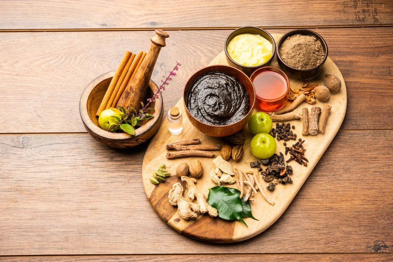 A vibrant display of fresh fruits, vegetables, herbal teas, and natural remedies, symbolizing holistic nutrition, herbal healing, and balanced well-being.