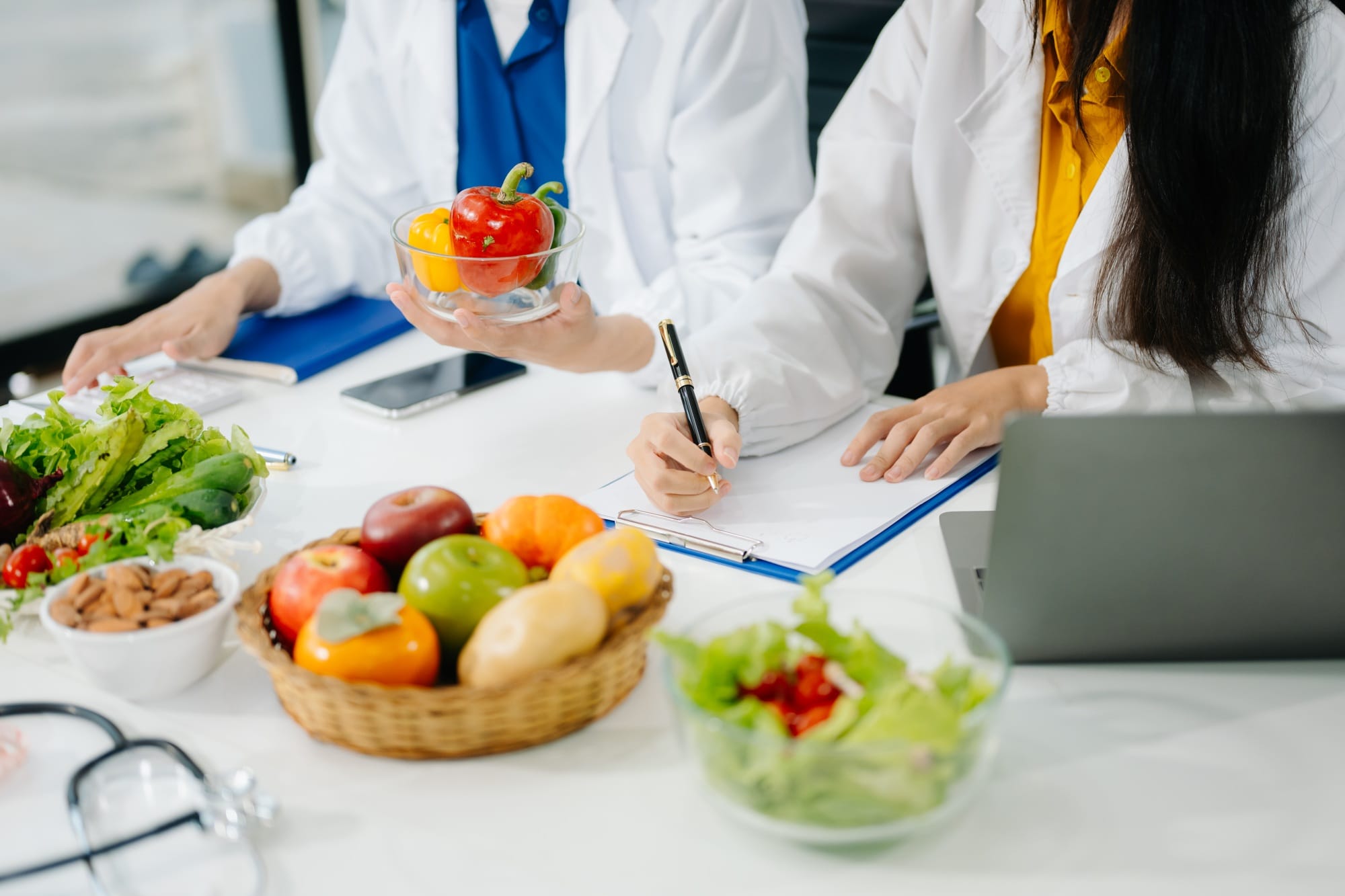 Nutritionists consulting on healthy food choices, meal planning, and wellness concepts
